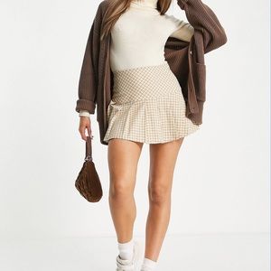 Monki polyester pleated mini skirt in beige dogtooth - BEIGE